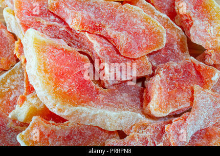 Dried papaya fruit in slices closeup macro shot Stock Photo