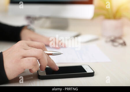 Man is using phone. Stock Photo