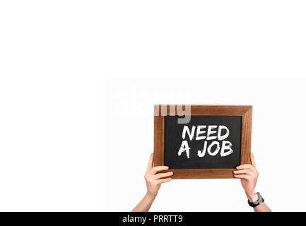 Woman holding chalkboard with inscription need a job isolated on white Stock Photo