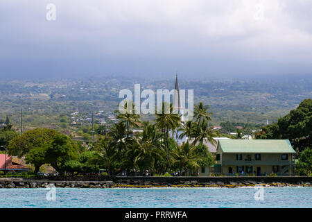 View of Downtown Kona, Hawaii, With View of Mountains and Sky in Background Stock Photo