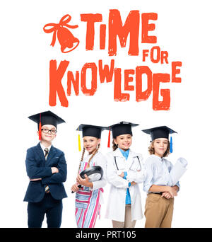 schoolchildren in costumes of different professions and graduation caps isolated on white, with 'time for knowledge' lettering Stock Photo