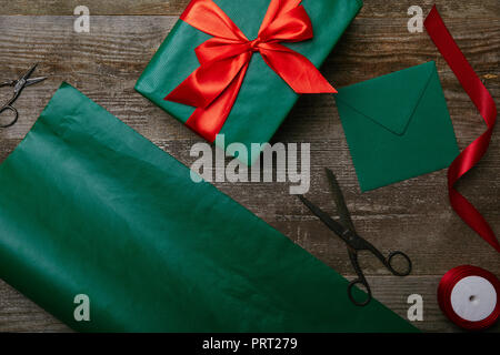 Christmas Gift Wrapping Party Time with Colorful Paper, Ribbon