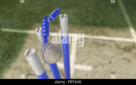 A white leather cricket ball hitting blue cricket wickets on a cracked grass pitch background - 3D render Stock Photo
