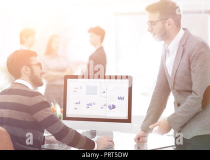 two businessmen analyzing stats financial data Stock Photo