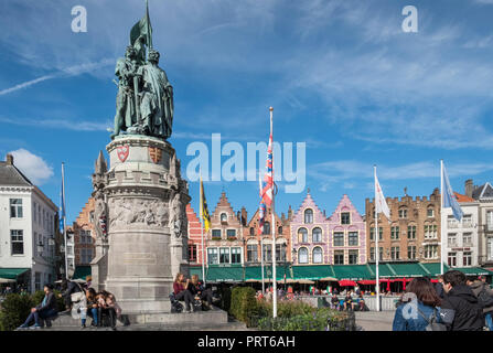 Street scene featuring Jan Breydel and Pieter de Coninck statue in market square, Markt, medieval city of Bruges, Flanders, Belgium Stock Photo