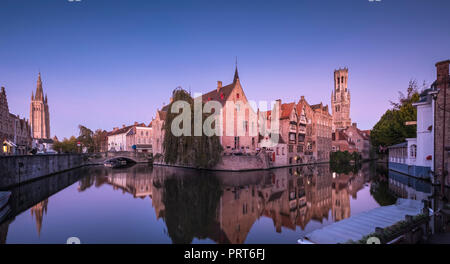 View of beautiful medieval buildings at Rozenhoedkaai photographed at dawn, Bruges (Brugge), West Flanders, Belgium. Stock Photo