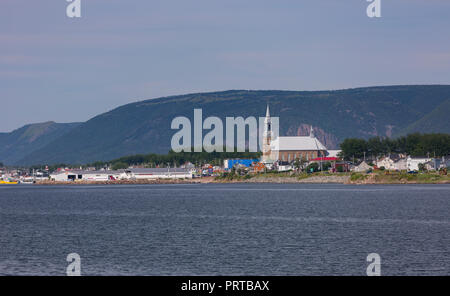 CHETICAMP, NOVA SCOTIA, CANADA - Church and town of Cheticamp, Cape Breton Island. Stock Photo