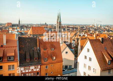 Top cityscape view from the castle hill on the old town with cathedral in Nurnberg during the morning, Germany Stock Photo