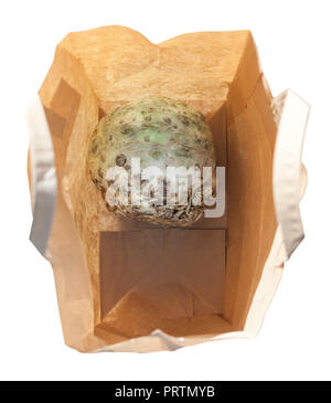 top view of celeriac in a paper bag isolated on white background Stock Photo
