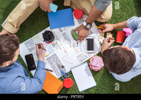 overhead view of business people working on new business plan, business teamwork Stock Photo