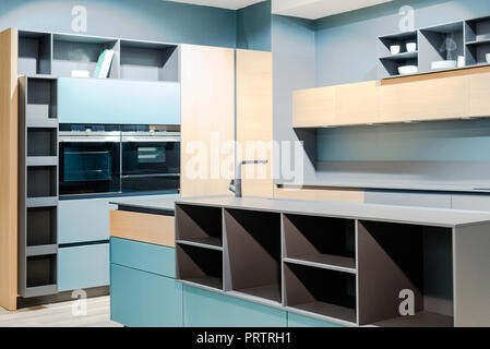 interior of contemporary wooden blue kitchen with comfortable furniture Stock Photo