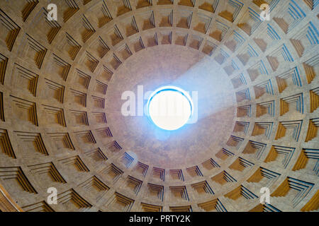 Interior view of oculus and coffered concrete ceiling of the dome in the  Pantheon - Rome, Italy - Stock Photo
