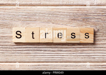 Stress word written on wood block. Stress text on table, concept. Stock Photo