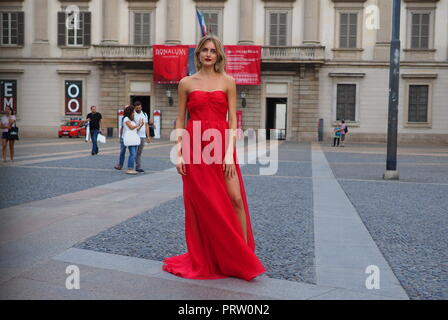 MILANO, Italy: September 21, 2018: Model posing for photographers in Duomo square after ACT 1 fashion show during MFW Stock Photo