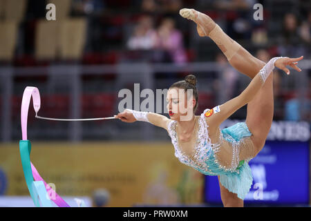 Sofia, Bulgaria - 14 September, 2018: Aleksandra SOLDATOVA froom Russia performs with ribbon during The 2018 Rhythmic Gymnastics World Championships.  Stock Photo