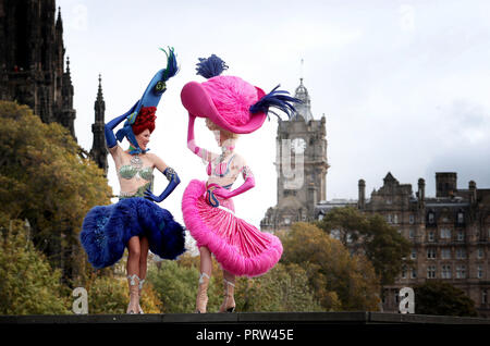 Mathilde Tutiaux (left) and Lucy Monaghan, can-can dancers from the Moulin Rouge in Paris, perform at opening of the new exhibition 'Pin-Ups: Toulouse-Lautrec and the Art of Celebrity' at the Royal Scottish Academy in Edinburgh. Stock Photo