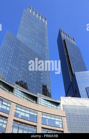 NEW YORK, USA - JULY 6, 2013: Architecture view of Columbus Circle in New York. Columbus Circle with famous Time Warner Center skyscrapers completed i Stock Photo