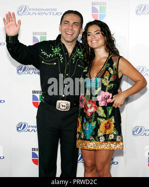 Cristian Castro (L) and his wife Valeria arrive for the 2007 Premios Juventud Awards at the University of Miami BankUnited Center in Coral Gables, Florida on July 19, 2007. Stock Photo