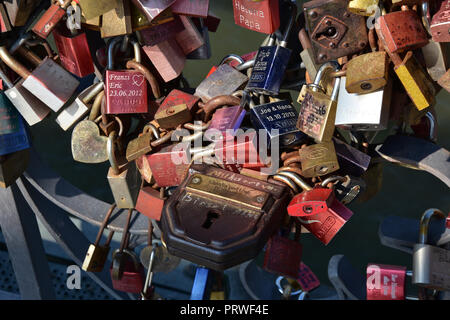 Close-up selective focus view of great number of padlocks with love vows Stock Photo
