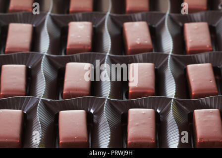 open package of set of chocolate candies Stock Photo