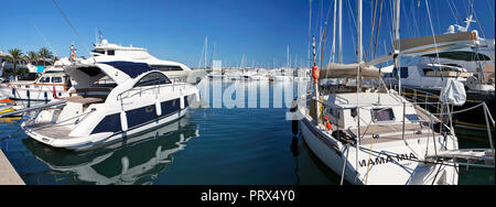 ALCUDIA, MAJORCA, SPAIN - September 23rd, 2018: Boats docking in the marina. Port d'Alcudia  is a popular resort town and holiday destination on the n Stock Photo