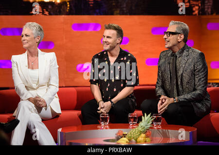 (Left to right) Jamie Lee Curtis, Gary Barlow, and Jeff Goldblum during the filming of the Graham Norton Show at BBC Studioworks 6 Television Centre, Wood Lane, London, to be aired on BBC One on Friday evening. Stock Photo