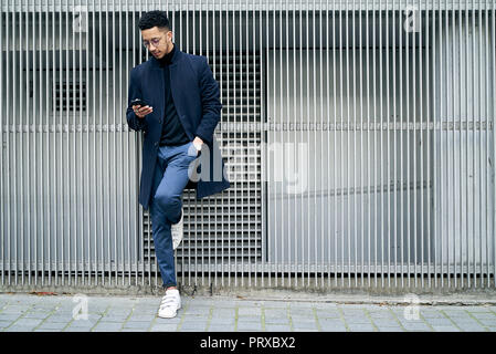 Businessman using smartphone Stock Photo