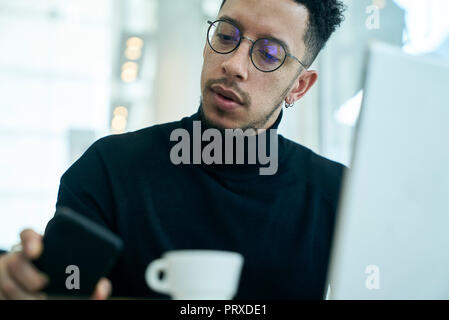 Businessman using smartphone Stock Photo