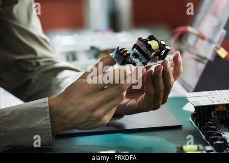 Close-up of engineer working in office Stock Photo