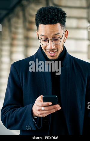 Businessman using smartphone Stock Photo