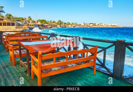 The beautiful summer terrace of cafe with a view on Aqaba Gulf and Dahab coast, Sinai, Egypt Stock Photo