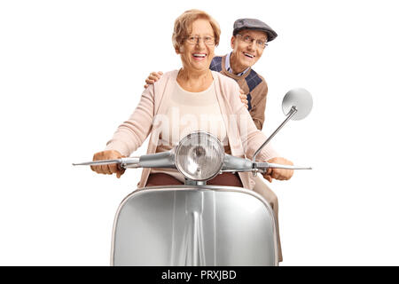 Cheerful seniors riding a vintage scooter isolated on white background Stock Photo