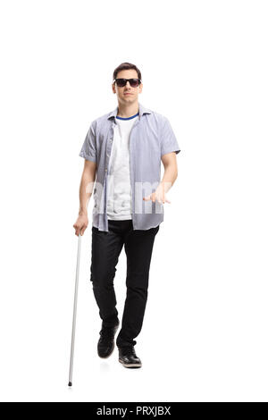 Full length portrait of a blind man walking isolated on white background Stock Photo