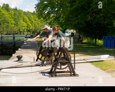 Lock keepers operate the locks by hand on the Rideau Canal, Ontario