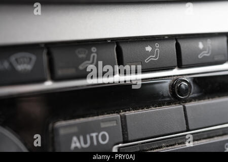 Closeup view on air conditioning panel in a car. Shallow depth of field. Stock Photo