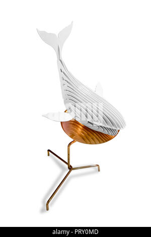 3D printed whale on brass table isolated on white Stock Photo
