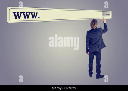 Rear view of a man wearing business suit searching for a web address touching the button of a huge virtual search bar placed above his head on retro g Stock Photo