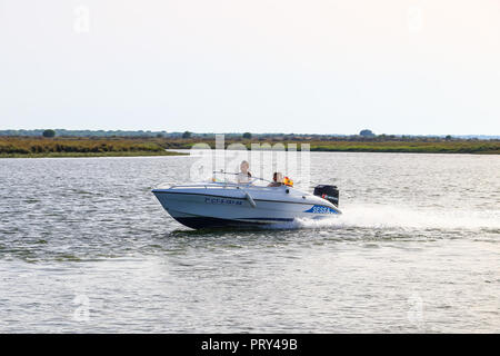 Huelva, Spain - July 16, 2017: Unidentified people enjoy activities on motor boat Punta Umbria beach Stock Photo