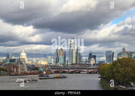 Panoramic view looking east from Waterloo Bridge over the River Thames to the City of London financial district skyscrapers and St Paul's Cathedral