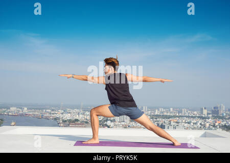 Man practicing advanced yoga. A series of yoga poses. lifestyle concept. Stock Photo