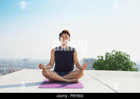Man practicing advanced yoga. A series of yoga poses. lifestyle concept. Stock Photo
