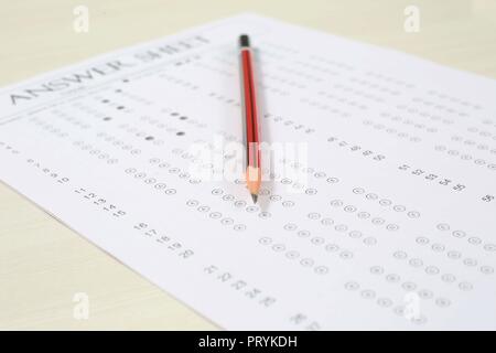Picture of omr sheet and pencil. Isolated on white background Stock Photo