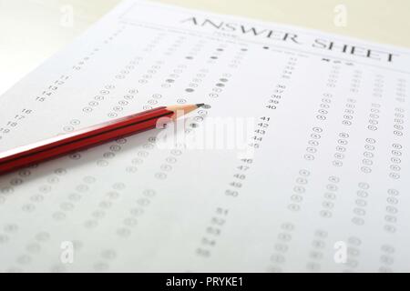 Picture of exam omr sheet and pencil. Isolated on white background. Stock Photo