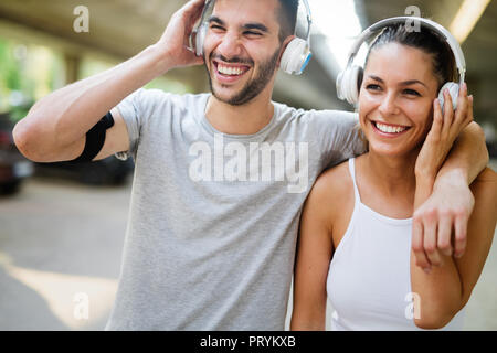 Fitness training for young couple in love Stock Photo