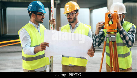 Team of architects people in group on construciton site Stock Photo