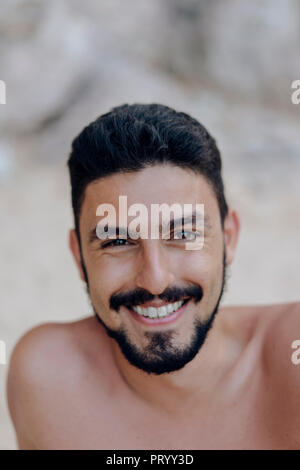 Portrait of smiling bearded man Stock Photo