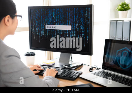 elegant manager works on personal information safety company   is trying to solve the hacker problem. Stock Photo
