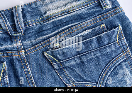 Back side of denim jeans texture detail with pocket, Close up. Blue jeans texture. Stock Photo