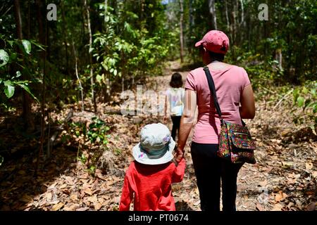 Mother and daughters walk along the Dalrymple gap walking track, QLD, Australia Stock Photo