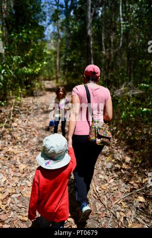 Mother and daughters walk along the Dalrymple gap walking track, QLD, Australia Stock Photo